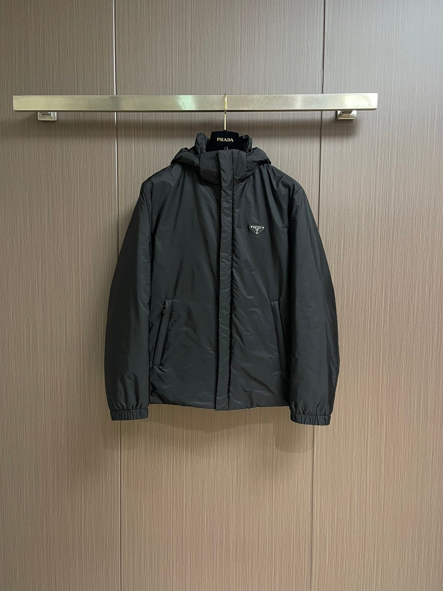 Pre-Owned Prada Down Jacket – Classic Hooded Puffer Coat with Iconic Triangle Logo, Black Edition