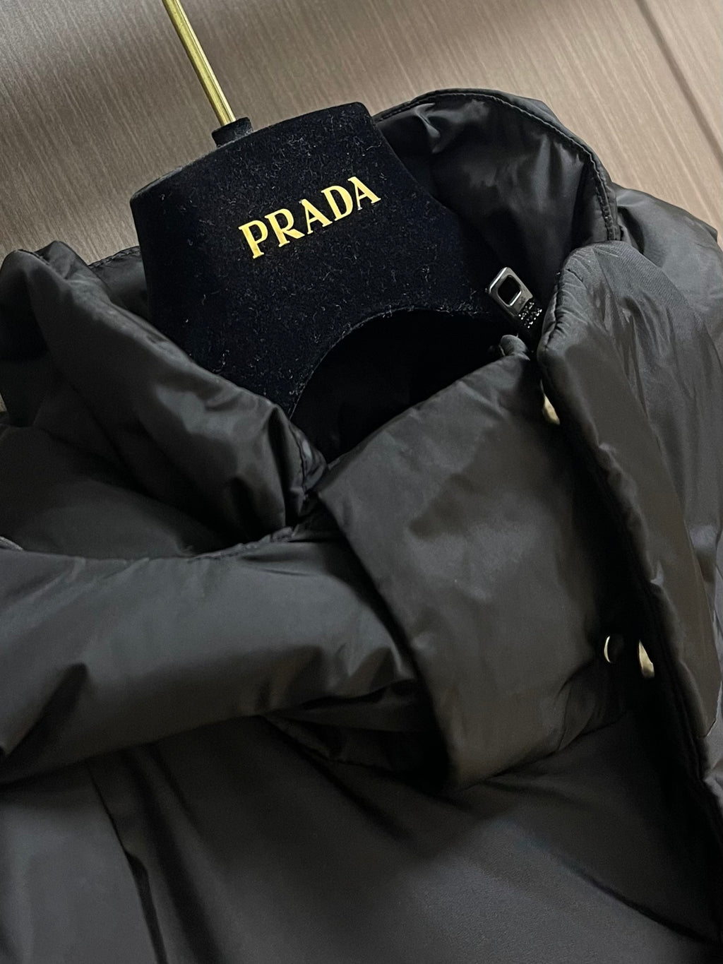 Pre-Owned Prada Down Jacket – Classic Hooded Puffer Coat with Iconic Triangle Logo, Black Edition