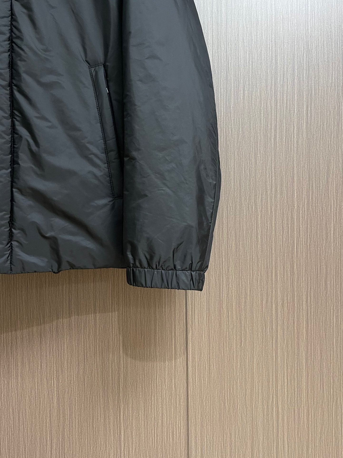 Pre-Owned Prada Down Jacket – Classic Hooded Puffer Coat with Iconic Triangle Logo, Black Edition