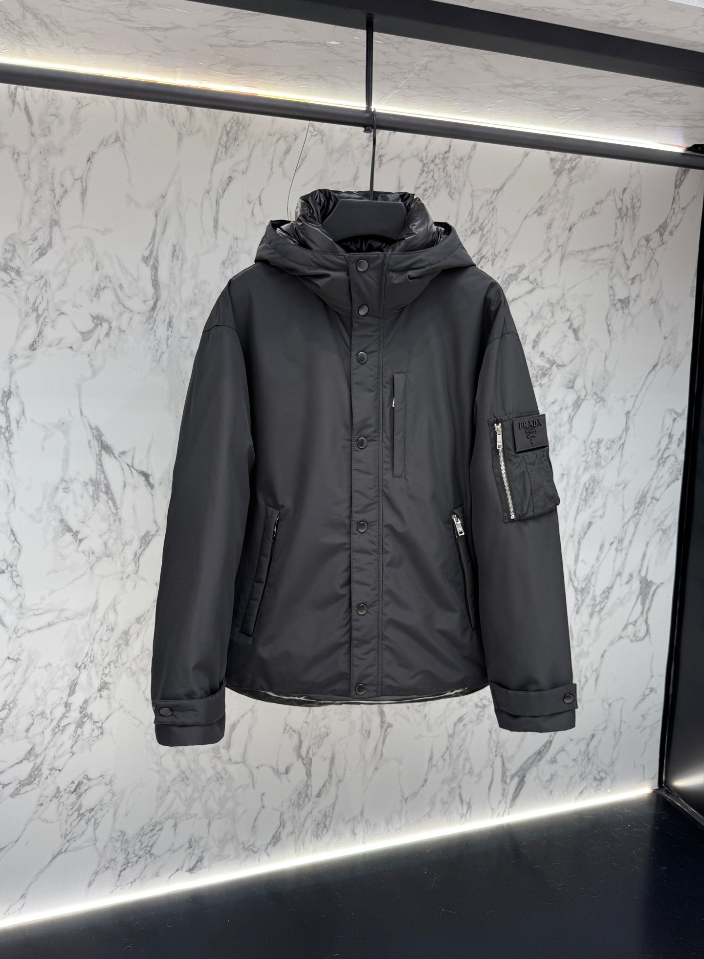 Pre-Owned Prada Nylon Down Jacket – Luxury Hooded Puffer with Metal Logo, Classic Black, Like New
