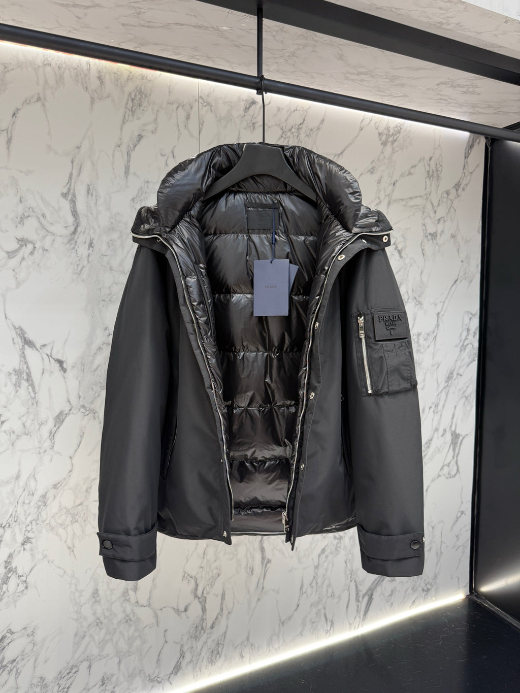 Pre-Owned Prada Nylon Down Jacket – Luxury Hooded Puffer with Metal Logo, Classic Black, Like New
