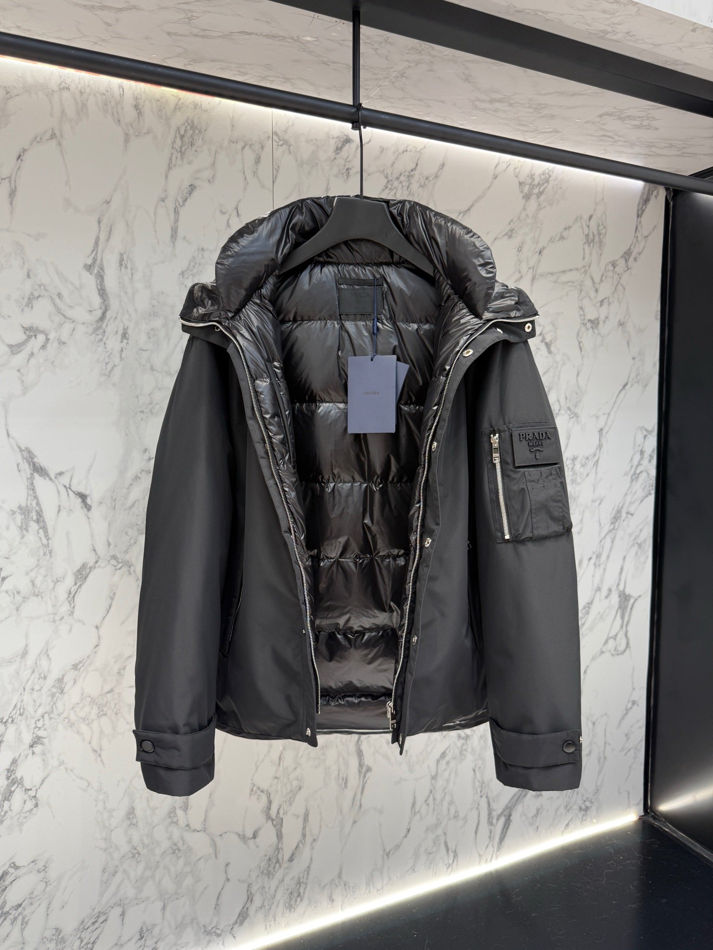 Pre-Owned Prada Nylon Down Jacket – Luxury Hooded Puffer with Metal Logo, Classic Black, Like New