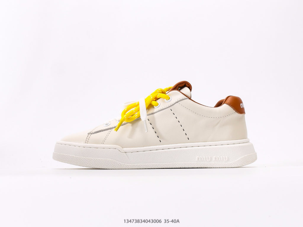 Pre-Owned Miu Miu Canvas Low-Top Sneakers with Logo Patch