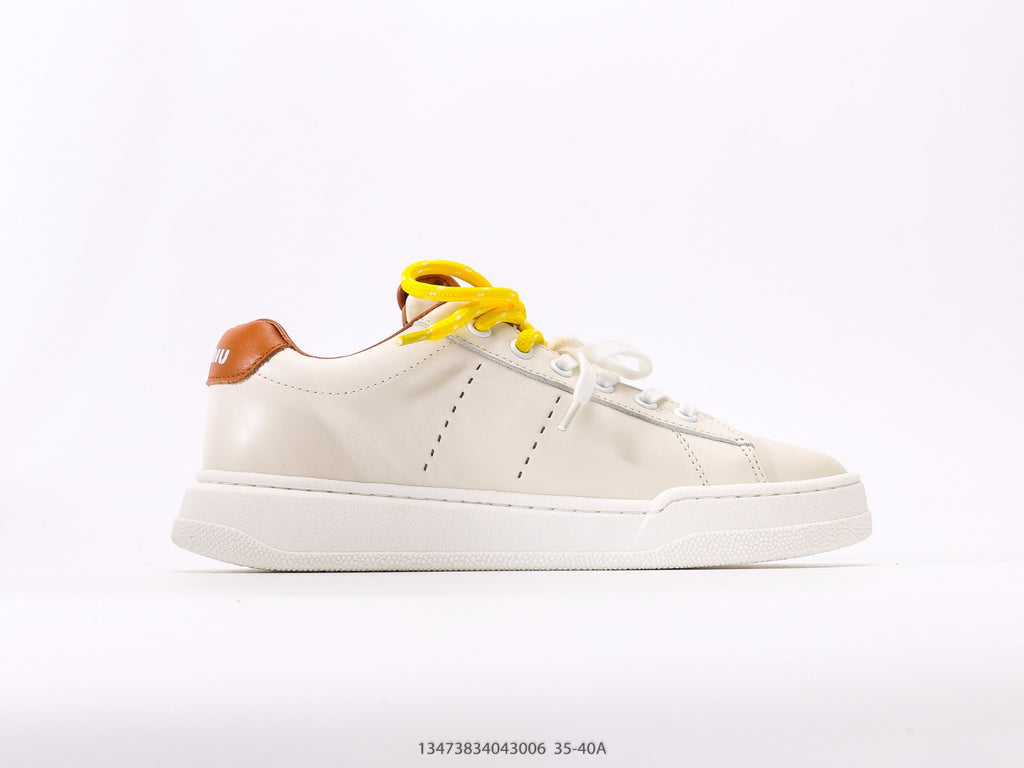 Pre-Owned Miu Miu Canvas Low-Top Sneakers with Logo Patch