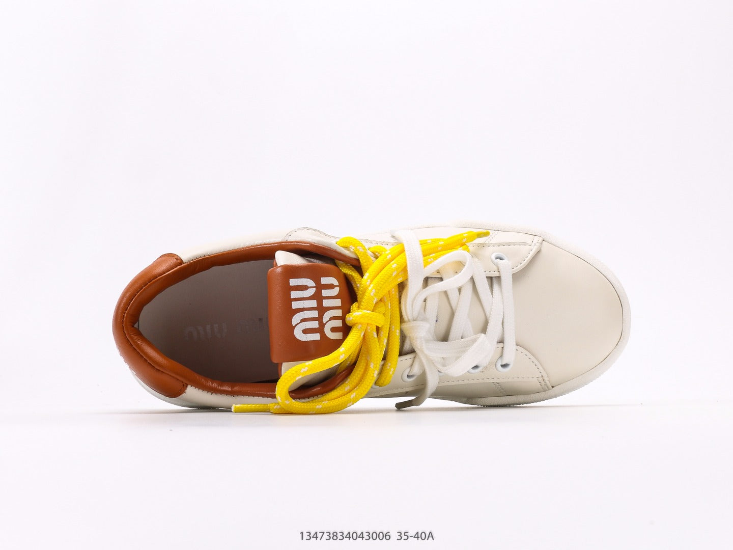Pre-Owned Miu Miu Canvas Low-Top Sneakers with Logo Patch