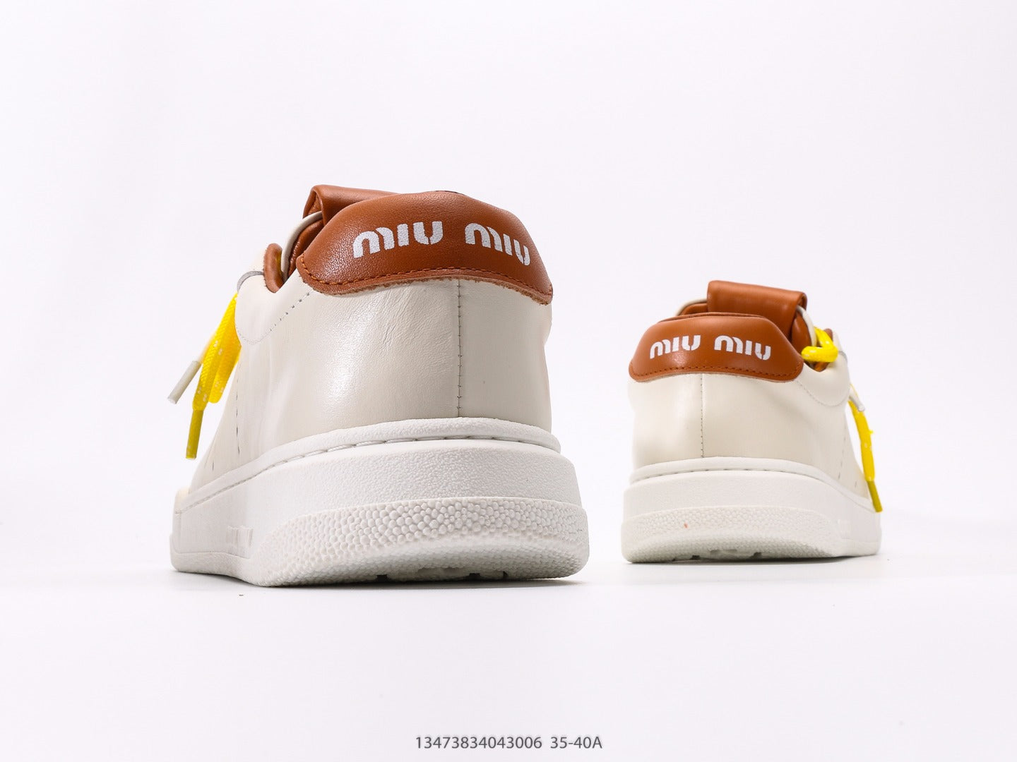 Pre-Owned Miu Miu Canvas Low-Top Sneakers with Logo Patch