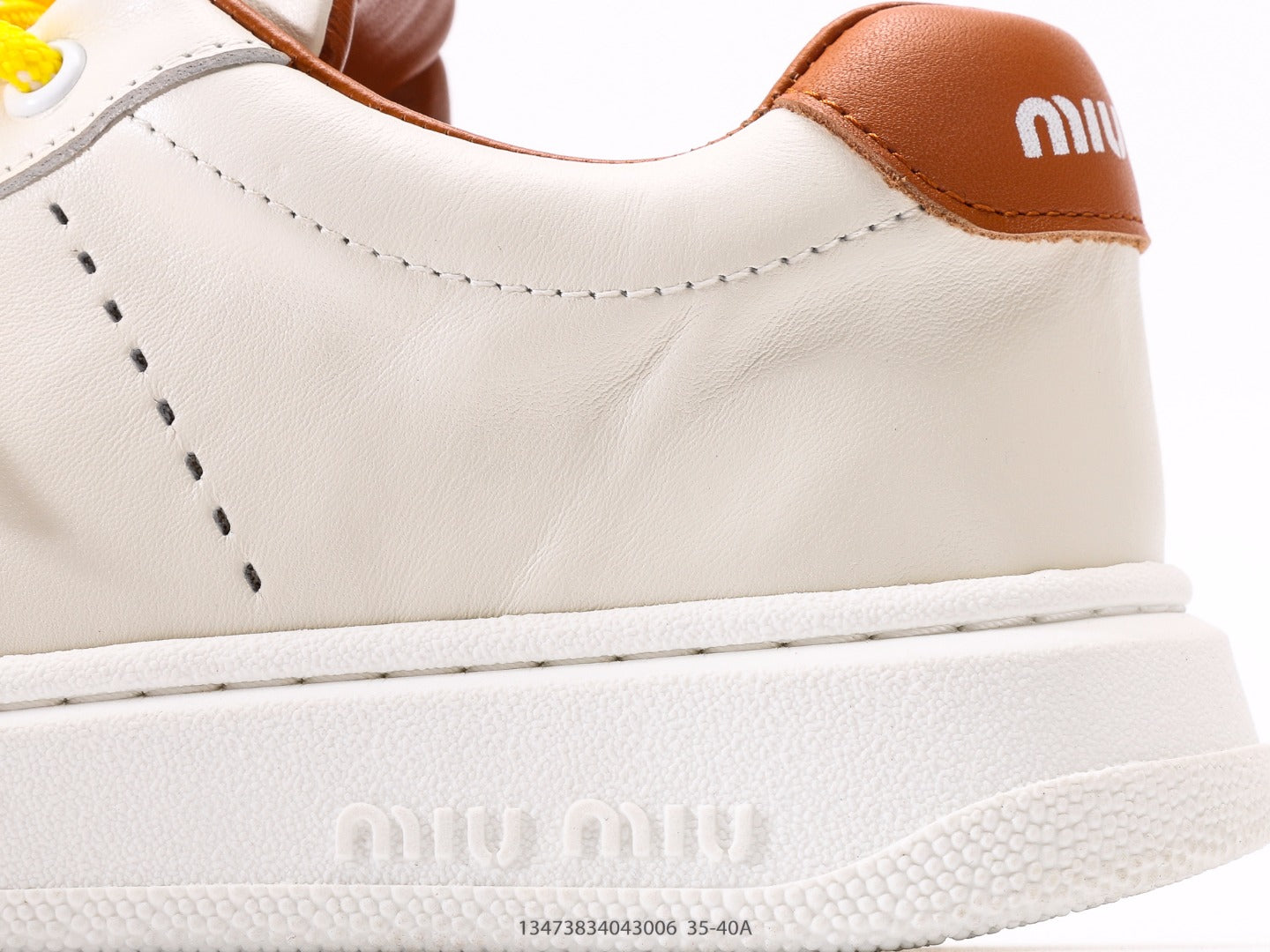 Pre-Owned Miu Miu Canvas Low-Top Sneakers with Logo Patch