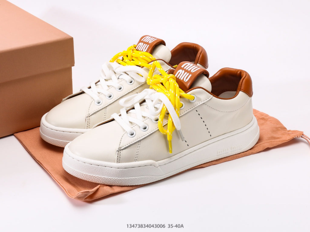 Pre-Owned Miu Miu Canvas Low-Top Sneakers with Logo Patch