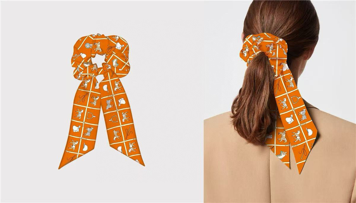 Pre-Owned Hermès Twilly Scarf – Double Use Hair Ribbon & Bag Accessory
