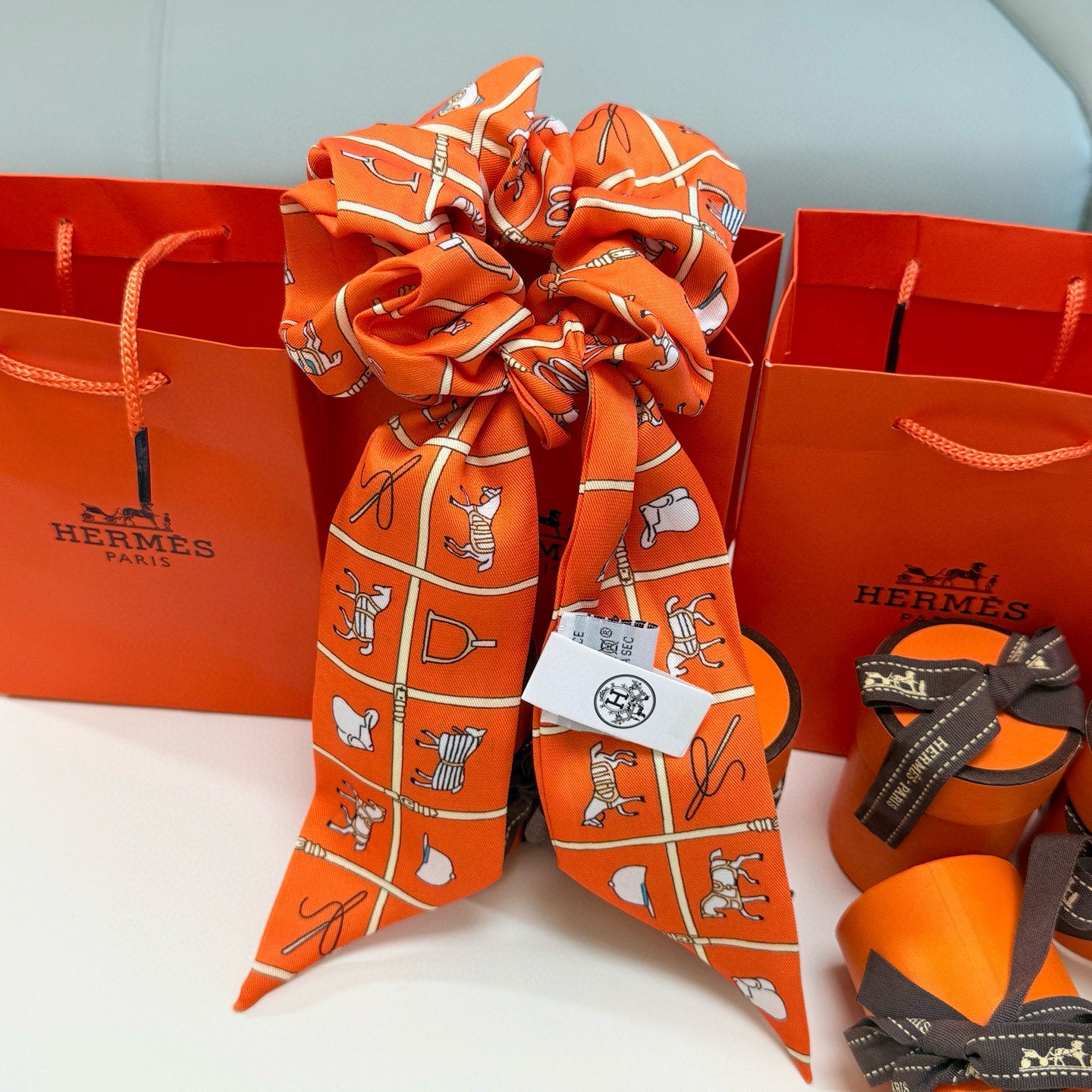 Pre-Owned Hermès Twilly Scarf – Double Use Hair Ribbon & Bag Accessory