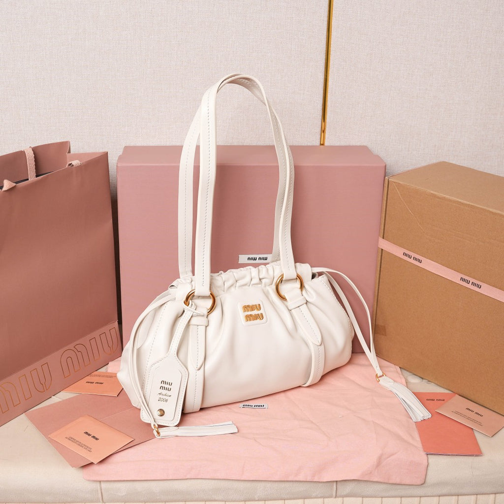 Pre-Owned Miu Miu Leather Hobo Bag – White Ruched Drawstring Design
