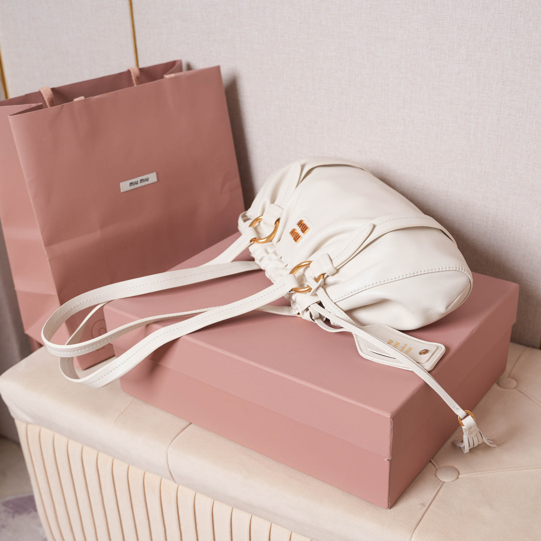 Pre-Owned Miu Miu Leather Hobo Bag – White Ruched Drawstring Design