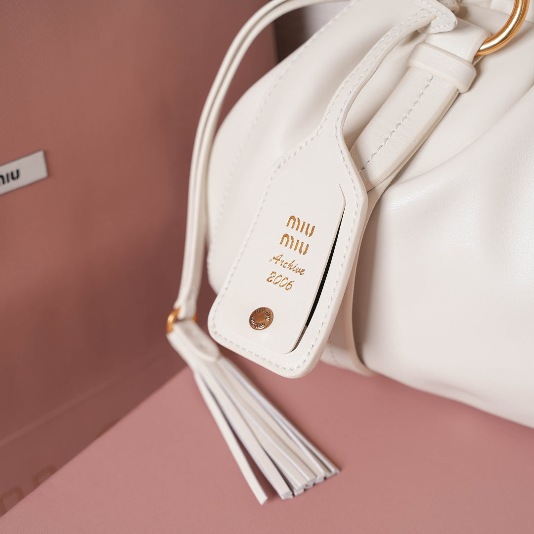 Pre-Owned Miu Miu Leather Hobo Bag – White Ruched Drawstring Design