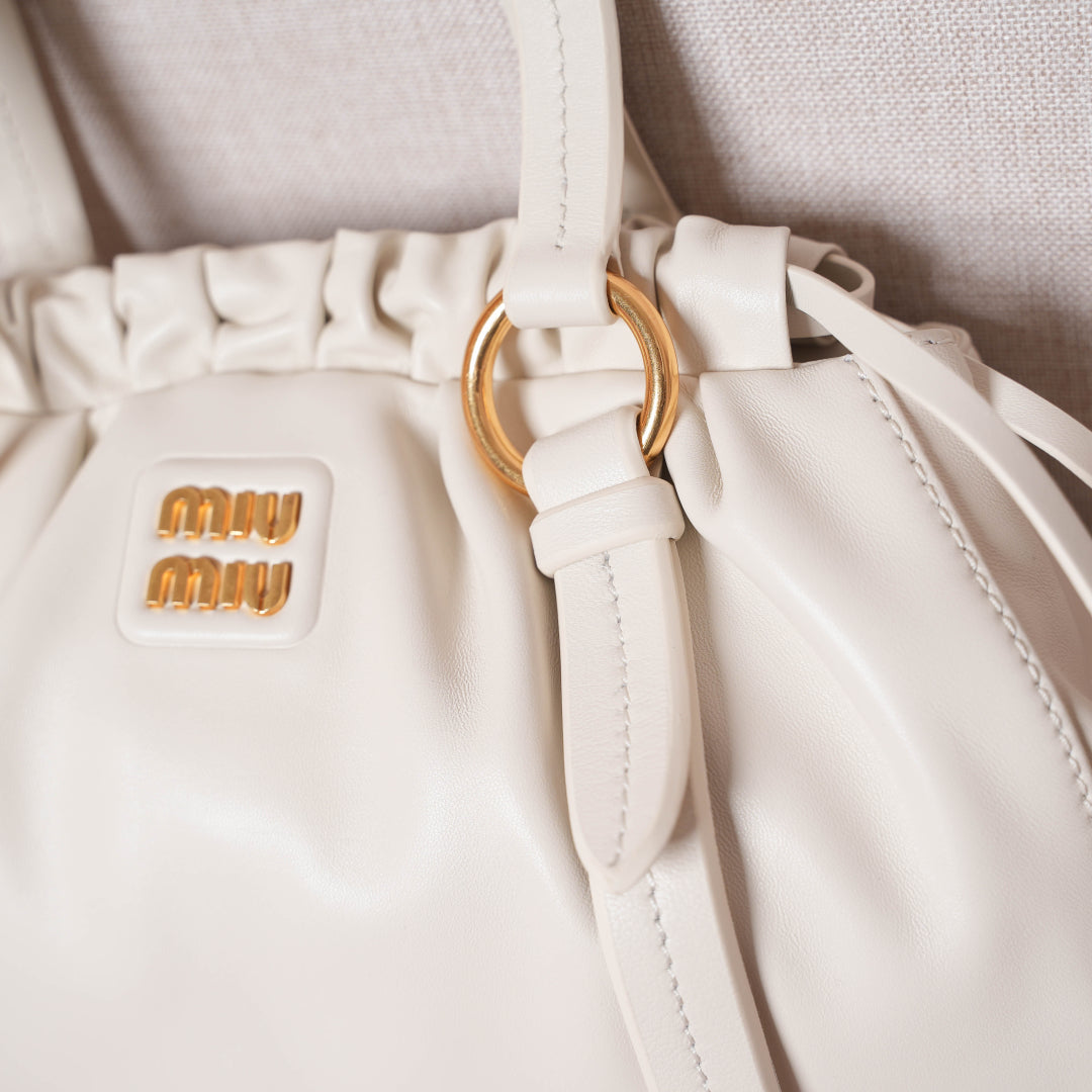 Pre-Owned Miu Miu Leather Hobo Bag – White Ruched Drawstring Design