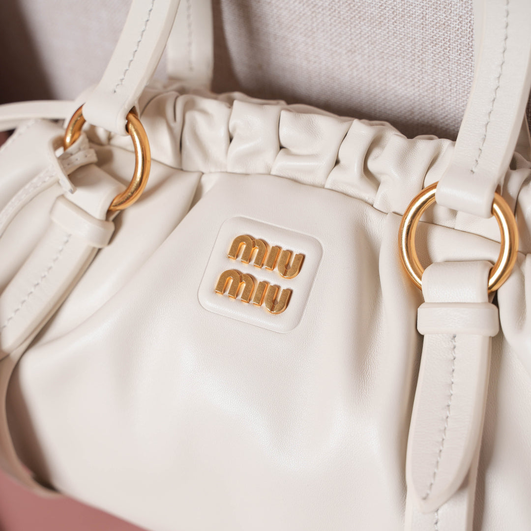 Pre-Owned Miu Miu Leather Hobo Bag – White Ruched Drawstring Design