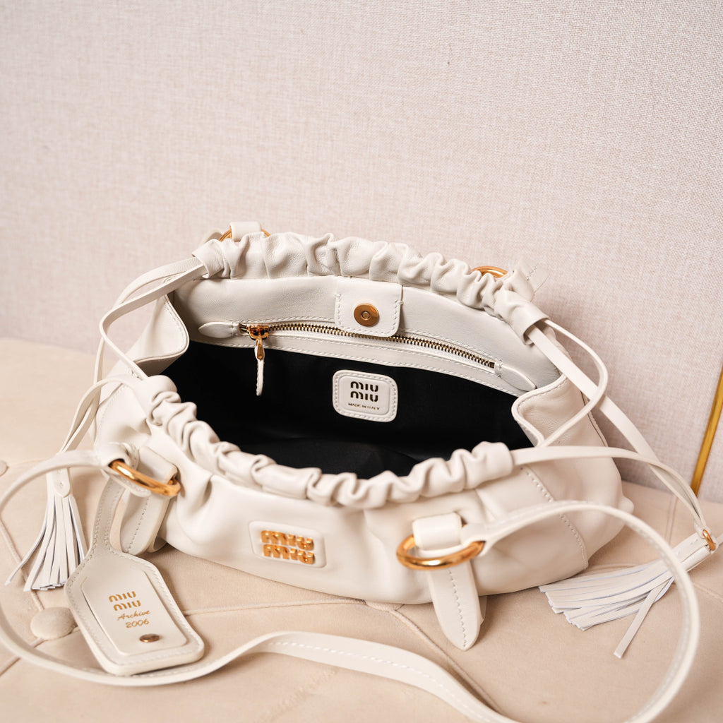 Pre-Owned Miu Miu Leather Hobo Bag – White Ruched Drawstring Design