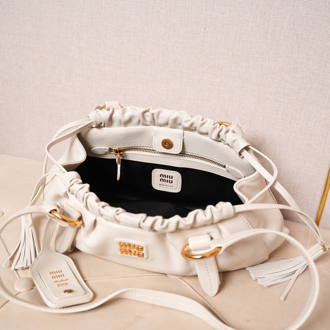 Pre-Owned Miu Miu Leather Hobo Bag – White Ruched Drawstring Design